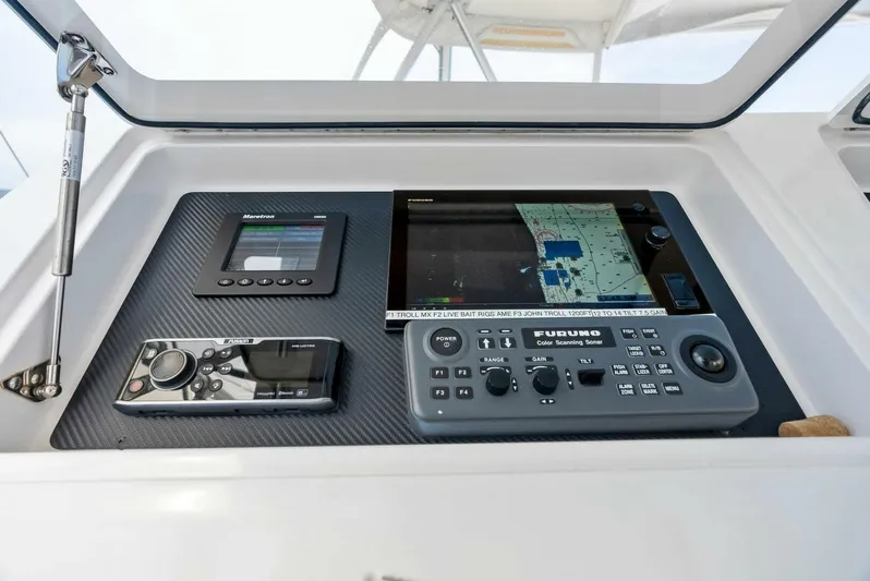True Grit Yacht Photos Pics Navigation console of 2006 Viking 56 Convertible yacht with advanced electronics.
