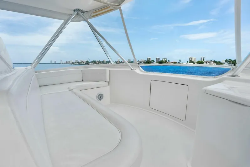 True Grit Yacht Photos Pics Viking 56 Convertible 2006 yacht interior with ocean view and city skyline.