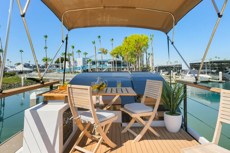  Yacht Photos Pics Navisyo Homes 28' NAVIS V.08, 2024 model, elegant deck with seating and marina view.