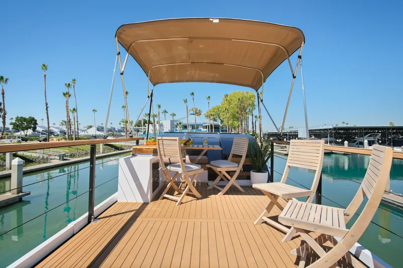  Yacht Photos Pics Luxurious 2024 Navisyo Homes 28' NAVIS V.08 yacht deck with seating and canopy.