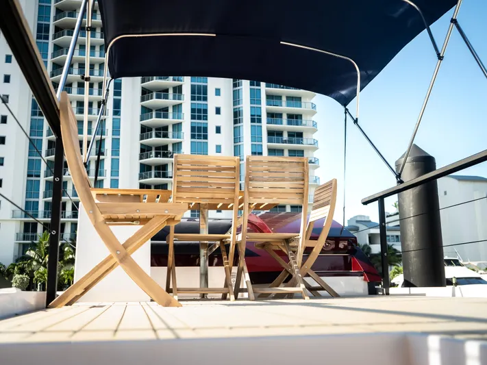  Yacht Photos Pics Navisyo Homes 28' NAVIS V.08 yacht deck with wooden chairs, 2024 model.