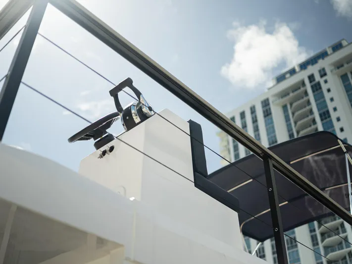  Yacht Photos Pics 2024 Navisyo Homes 28' NAVIS V.08 boat helm with cityscape background.