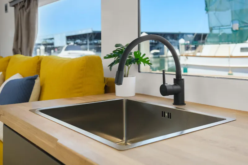  Yacht Photos Pics Modern kitchen sink in 2024 Navisyo Homes 28' NAVIS V.08 houseboat interior.