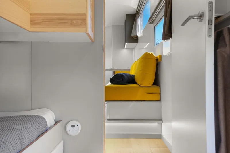  Yacht Photos Pics Interior of 2024 Navisyo Homes 28' NAVIS V.08 with modern seating and bright decor.