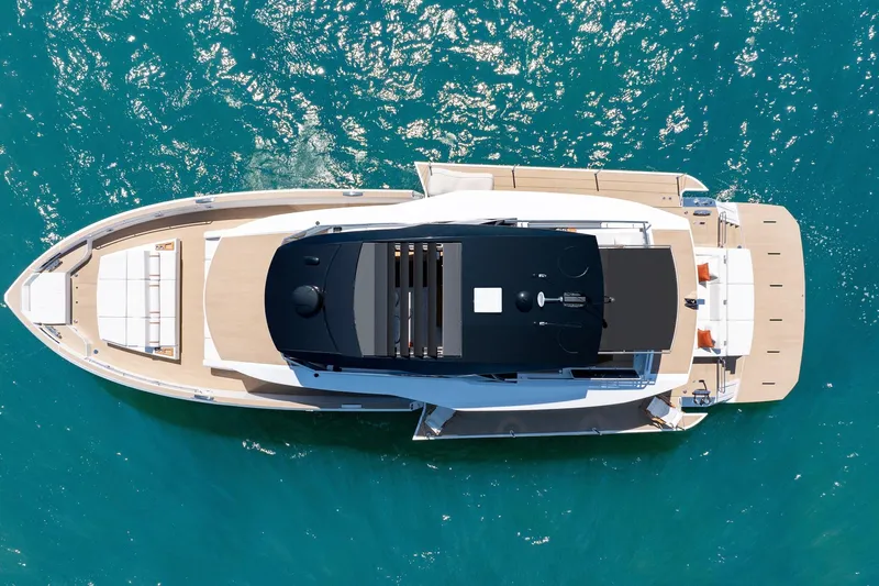  Yacht Photos Pics Aerial view of 2026 Pardo Yachts E72 luxury yacht on blue water.