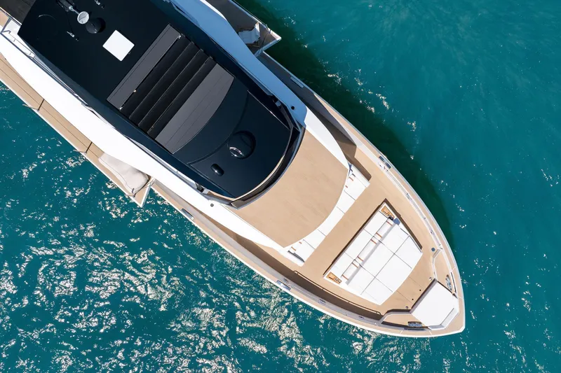  Yacht Photos Pics Aerial view of 2026 Pardo Yachts E72 luxury yacht on clear blue water.