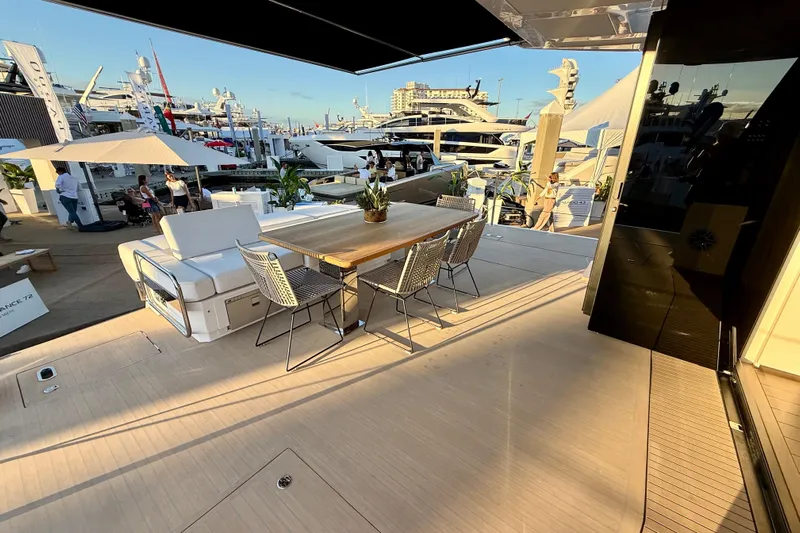  Yacht Photos Pics Luxurious deck of 2026 Pardo Yachts E72 with elegant outdoor seating and table.
