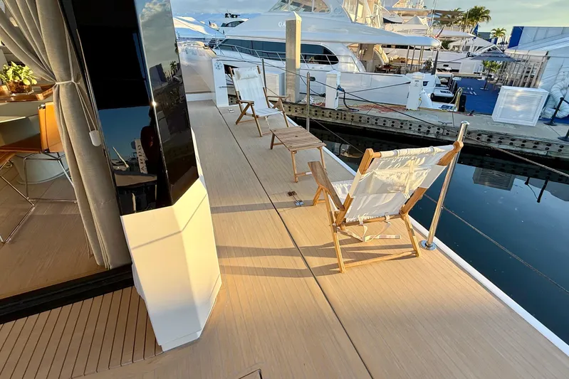  Yacht Photos Pics Luxury deck of 2026 Pardo Yachts E72 with chairs and marina view.