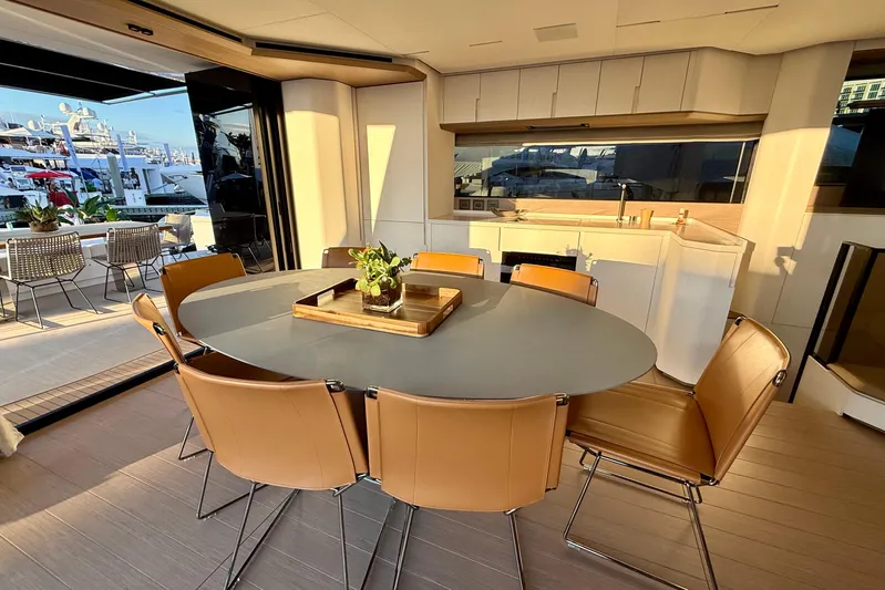  Yacht Photos Pics Luxurious interior of 2026 Pardo Yachts E72 with elegant dining area and modern kitchen.