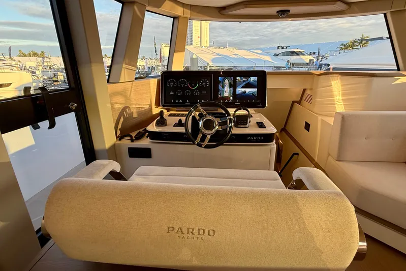  Yacht Photos Pics Helm of 2026 Pardo Yachts E72, featuring modern controls and panoramic views.