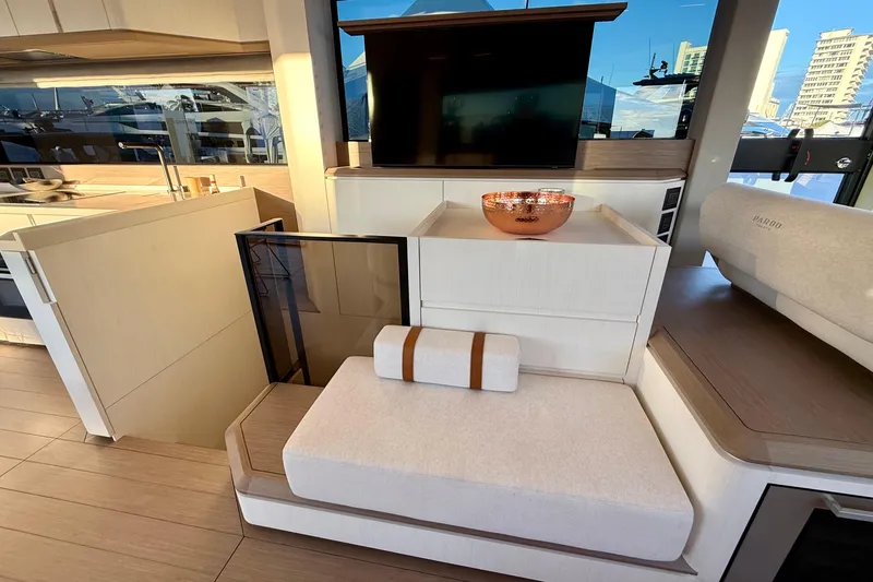 Yacht Photos Pics Luxurious interior of 2026 Pardo Yachts E72 with modern kitchen and seating area.