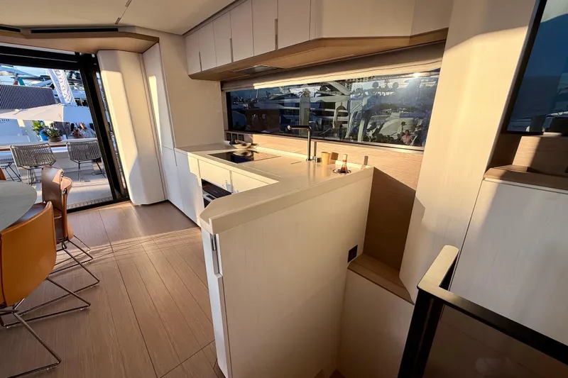  Yacht Photos Pics Modern kitchen interior of 2026 Pardo Yachts E72, featuring sleek design and ample natural light.