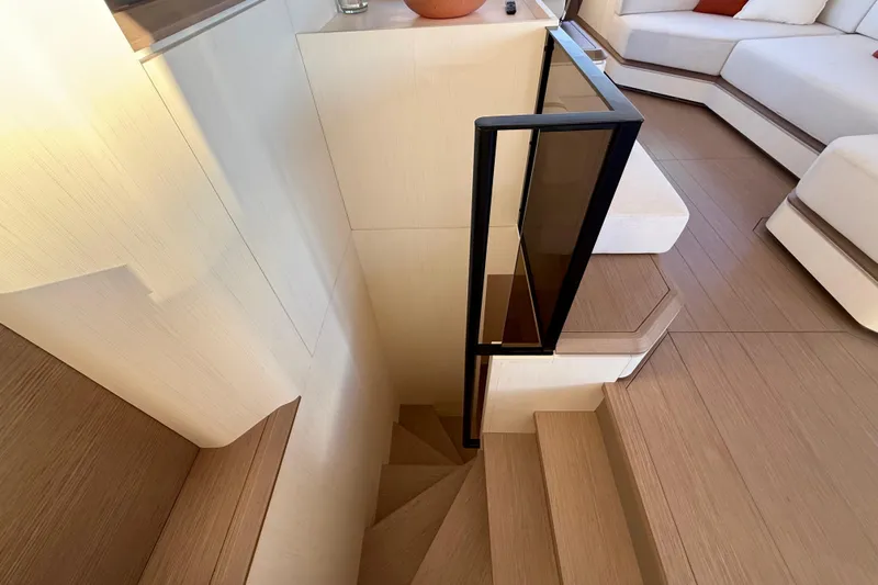  Yacht Photos Pics Interior of 2026 Pardo Yachts E72, featuring modern staircase and elegant seating area.