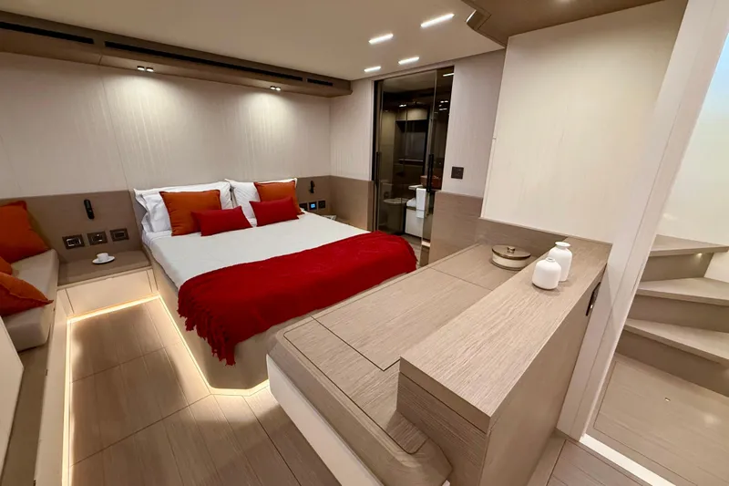  Yacht Photos Pics Luxurious 2026 Pardo Yachts E72 cabin with modern design, cozy bed, and elegant lighting.