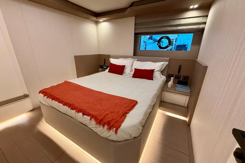  Yacht Photos Pics Luxurious bedroom interior of 2026 Pardo Yachts E72 with modern design and cozy bedding.