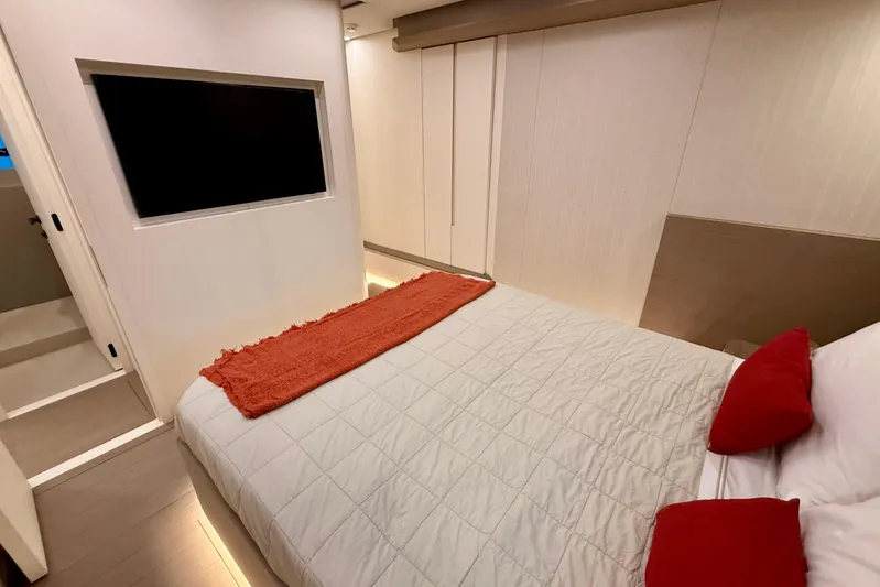  Yacht Photos Pics Luxurious bedroom interior of 2026 Pardo Yachts E72 with modern design and cozy bedding.