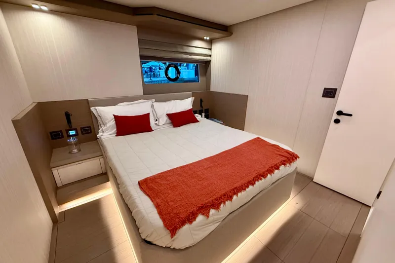  Yacht Photos Pics Luxurious bedroom interior of 2026 Pardo Yachts E72 with modern design and cozy bedding.