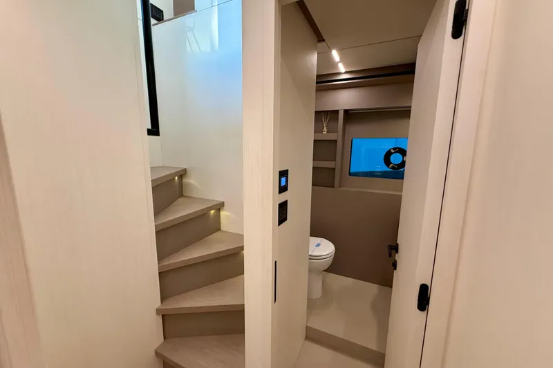  Yacht Photos Pics Interior of 2026 Pardo Yachts E72, featuring modern staircase and bathroom.