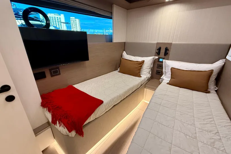  Yacht Photos Pics Luxurious cabin interior of 2026 Pardo Yachts E72 with twin beds and modern decor.