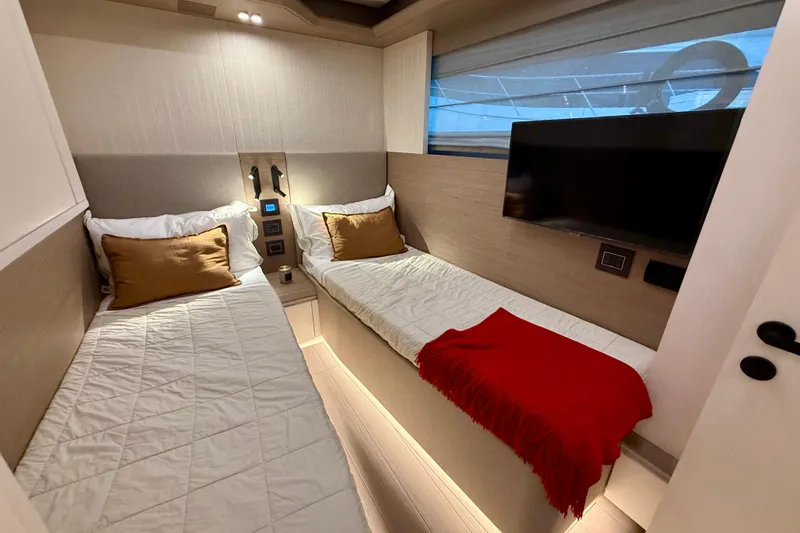  Yacht Photos Pics Luxurious cabin interior of 2026 Pardo Yachts E72 with twin beds and modern amenities.