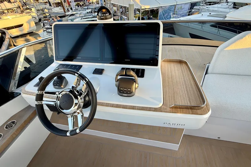  Yacht Photos Pics 2026 Pardo Yachts E72 helm with modern controls and dual screens.