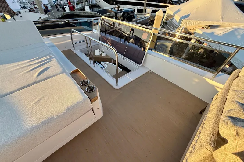  Yacht Photos Pics Luxurious deck of 2026 Pardo Yachts E72 with sunbed and sleek railing design.