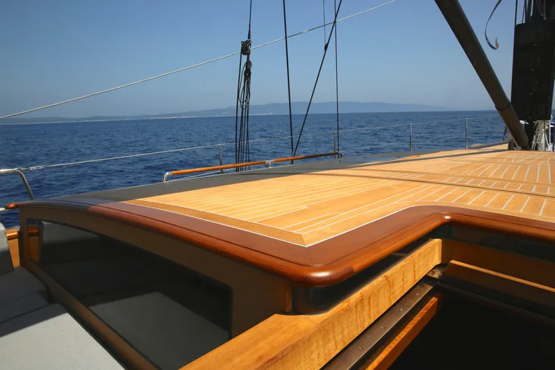 Black Pearl Yacht Photos Pics Luxurious 2013 Solaris 72 Classic yacht deck with lifting keel, sailing on open sea.