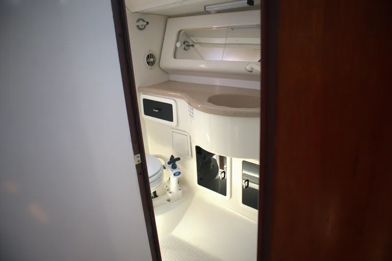 Immunity Yacht Photos Pics Interior view of 1996 Catalina 400 yacht bathroom with sink and toilet.