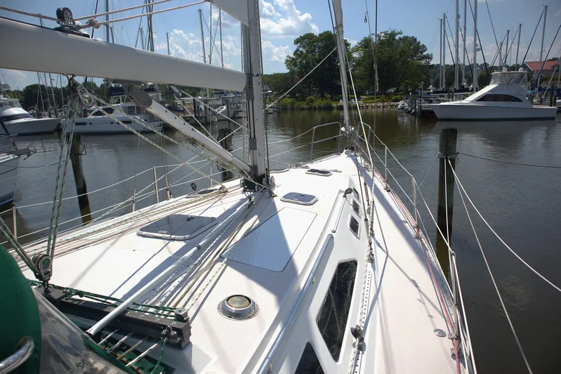 Immunity Yacht Photos Pics Sailboat Catalina 400, 1996 model, docked in a marina with clear skies.