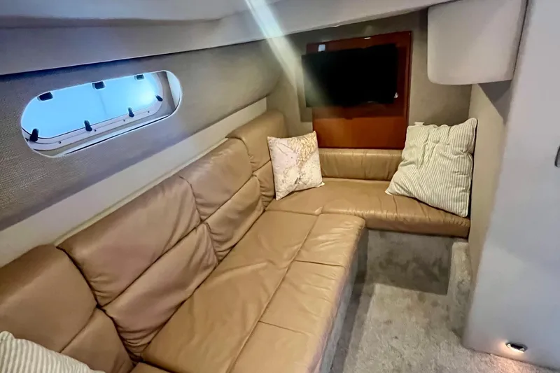 Talitoo Yacht Photos Pics Luxurious interior of 2006 Formula 37 PC yacht with leather seating and cozy decor.