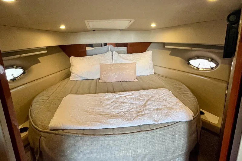 Talitoo Yacht Photos Pics Luxurious cabin interior of 2006 Formula 37 PC yacht with cozy bedding.