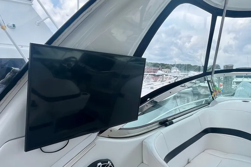 Talitoo Yacht Photos Pics 2006 Formula 37 PC yacht interior with TV and marina view.