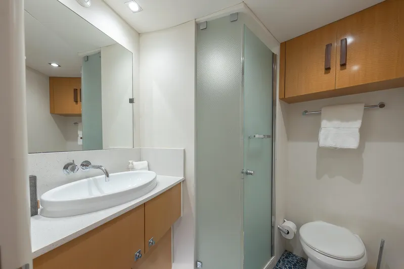 Whistle Yacht Photos Pics Luxurious 2012 Lazzara Breeze yacht bathroom with modern fixtures and elegant design.
