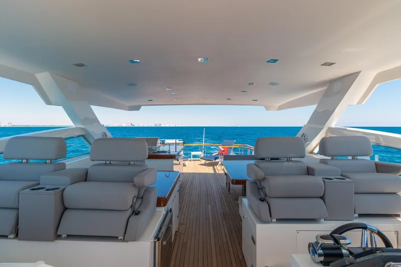 Whistle Yacht Photos Pics Luxurious 2012 Lazzara Breeze yacht interior with ocean view and modern seating.