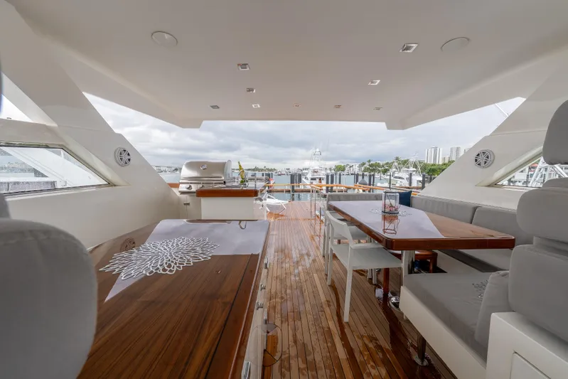 Whistle Yacht Photos Pics Luxurious 2012 Lazzara Breeze yacht interior with elegant seating and dining area.