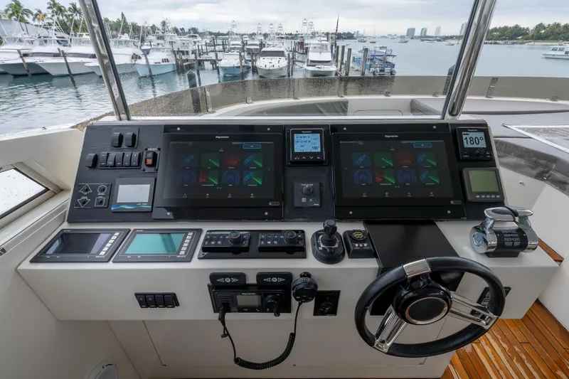 Whistle Yacht Photos Pics Control panel of a 2012 Lazzara Breeze yacht with advanced navigation systems.