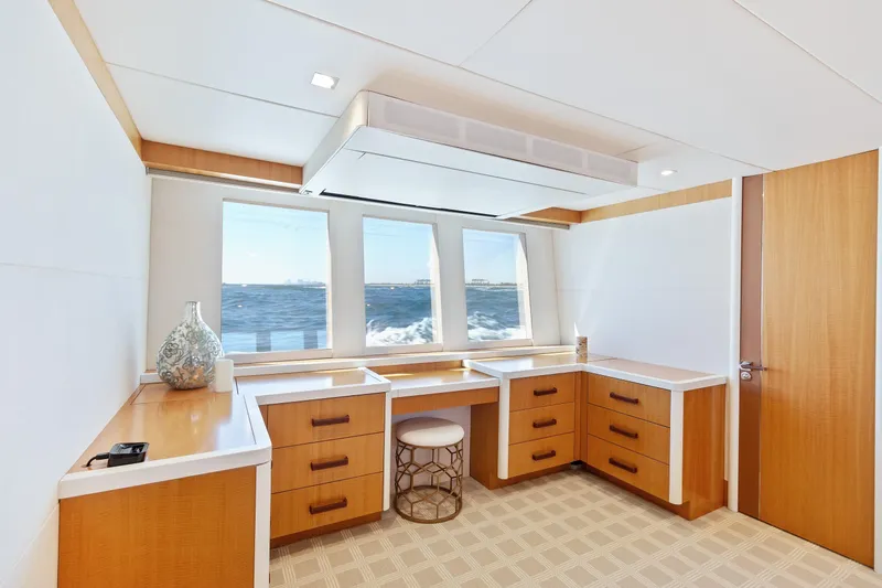 Whistle Yacht Photos Pics Luxurious 2012 Lazzara Breeze yacht interior with ocean view, featuring elegant wood cabinetry and modern design.