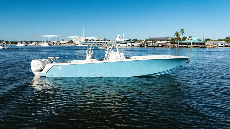  Yacht Photos Pics 2020 SeaVee 370z boat on calm water with clear blue sky.