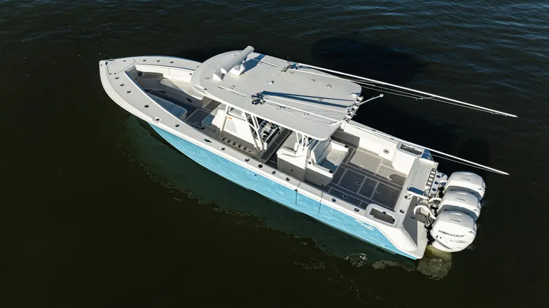  Yacht Photos Pics 2020 SeaVee 370z boat with triple outboard engines on calm water.