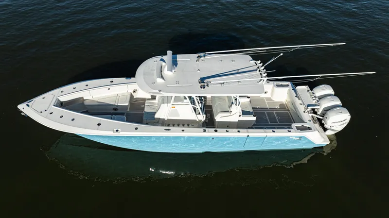  Yacht Photos Pics 2020 SeaVee 370z boat with triple outboard engines on calm water.