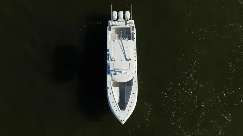  Yacht Photos Pics Aerial view of 2020 SeaVee 370z boat on dark water.