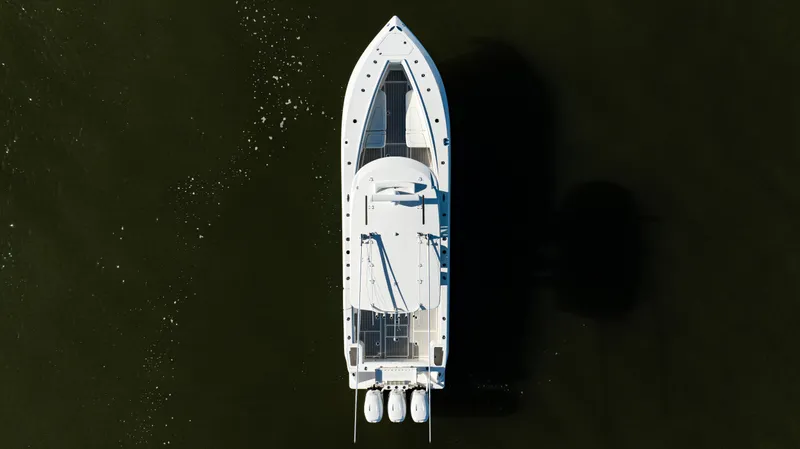  Yacht Photos Pics Aerial view of 2020 SeaVee 370z boat on dark water.