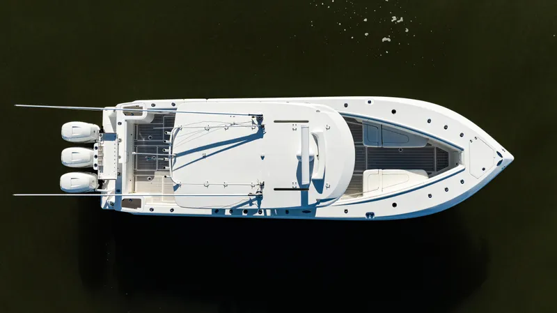  Yacht Photos Pics Aerial view of 2020 SeaVee 370z boat with triple engines on dark water.