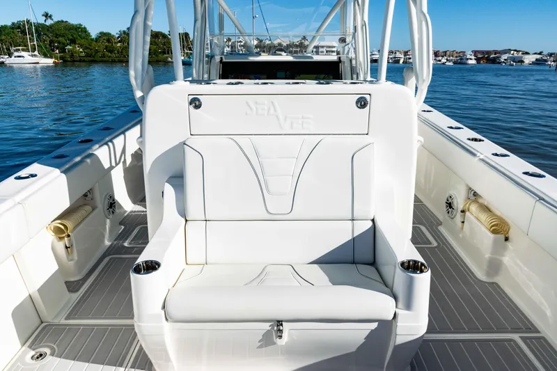  Yacht Photos Pics 2020 SeaVee 370z boat interior with white seating, cup holders, and ocean view.