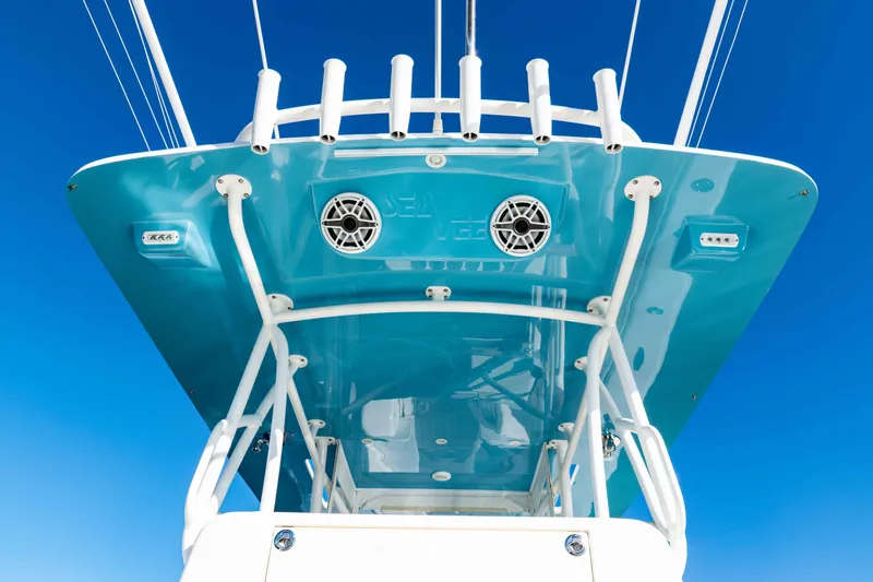  Yacht Photos Pics 2020 SeaVee 370z boat's sleek blue canopy with rod holders and speakers.