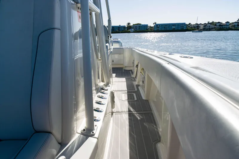  Yacht Photos Pics 2020 SeaVee 370z boat deck with sleek design, overlooking calm waters.