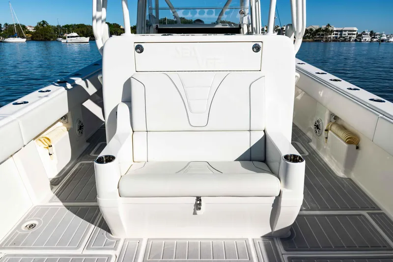  Yacht Photos Pics 2020 SeaVee 370z boat interior with white seating and cup holders on a sunny day.
