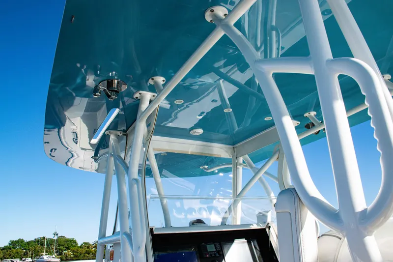  Yacht Photos Pics 2020 SeaVee 370z boat with sleek blue canopy and modern design elements.