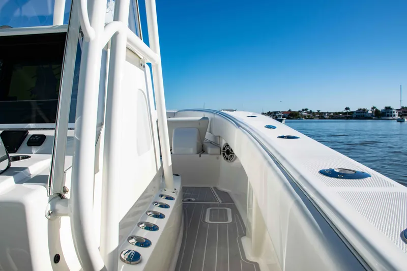  Yacht Photos Pics 2020 SeaVee 370z boat deck with ocean view and clear blue sky.