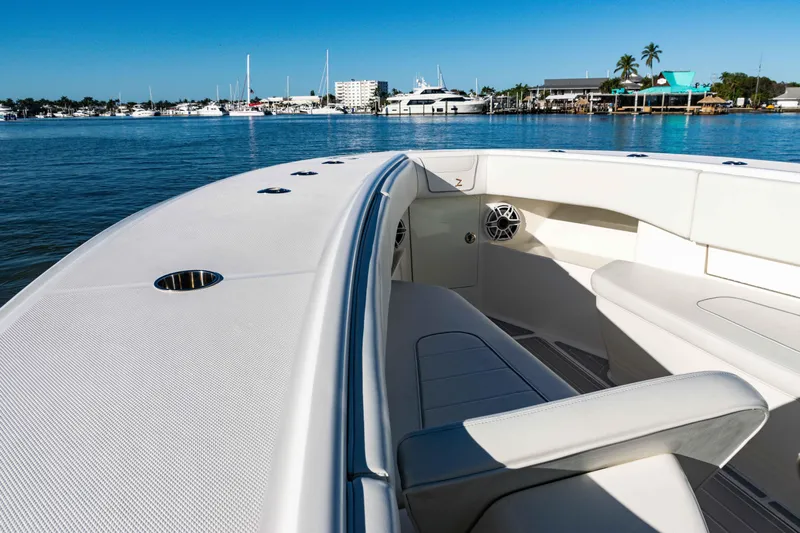 Yacht Photos Pics 2020 SeaVee 370z boat interior with waterfront view, featuring sleek seating and modern design.